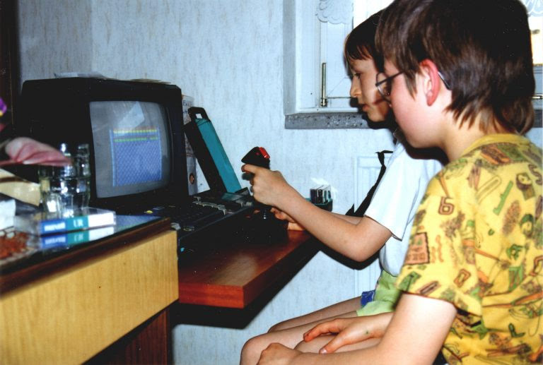 Me with Goetz, playing Arkanoid on the CPC 464